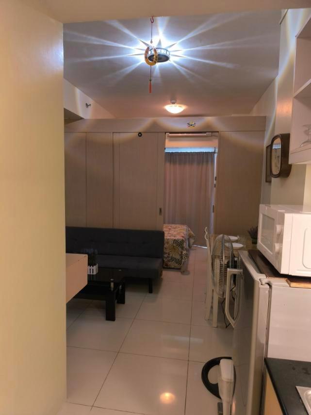 טגאיטאי Breezy Nest Staycation At Wind Residences Tagaytay מראה חיצוני תמונה