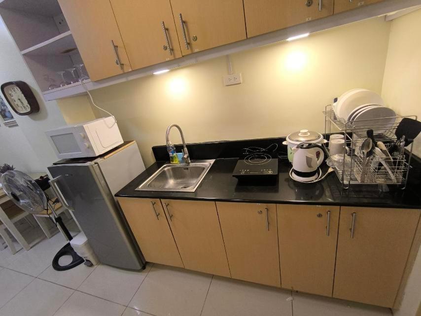 טגאיטאי Breezy Nest Staycation At Wind Residences Tagaytay מראה חיצוני תמונה