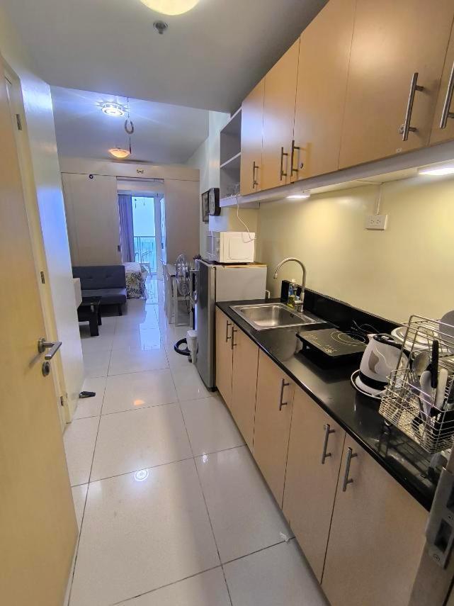 טגאיטאי Breezy Nest Staycation At Wind Residences Tagaytay מראה חיצוני תמונה